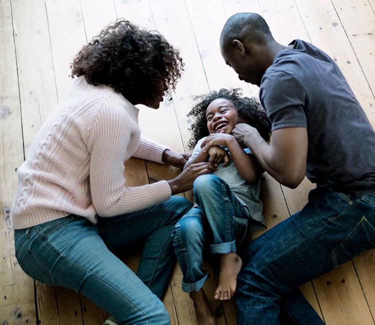 family playing together in a safe home, home security